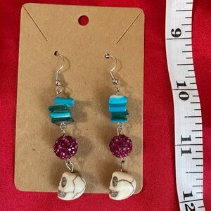 Sparkly skull dangle earrings